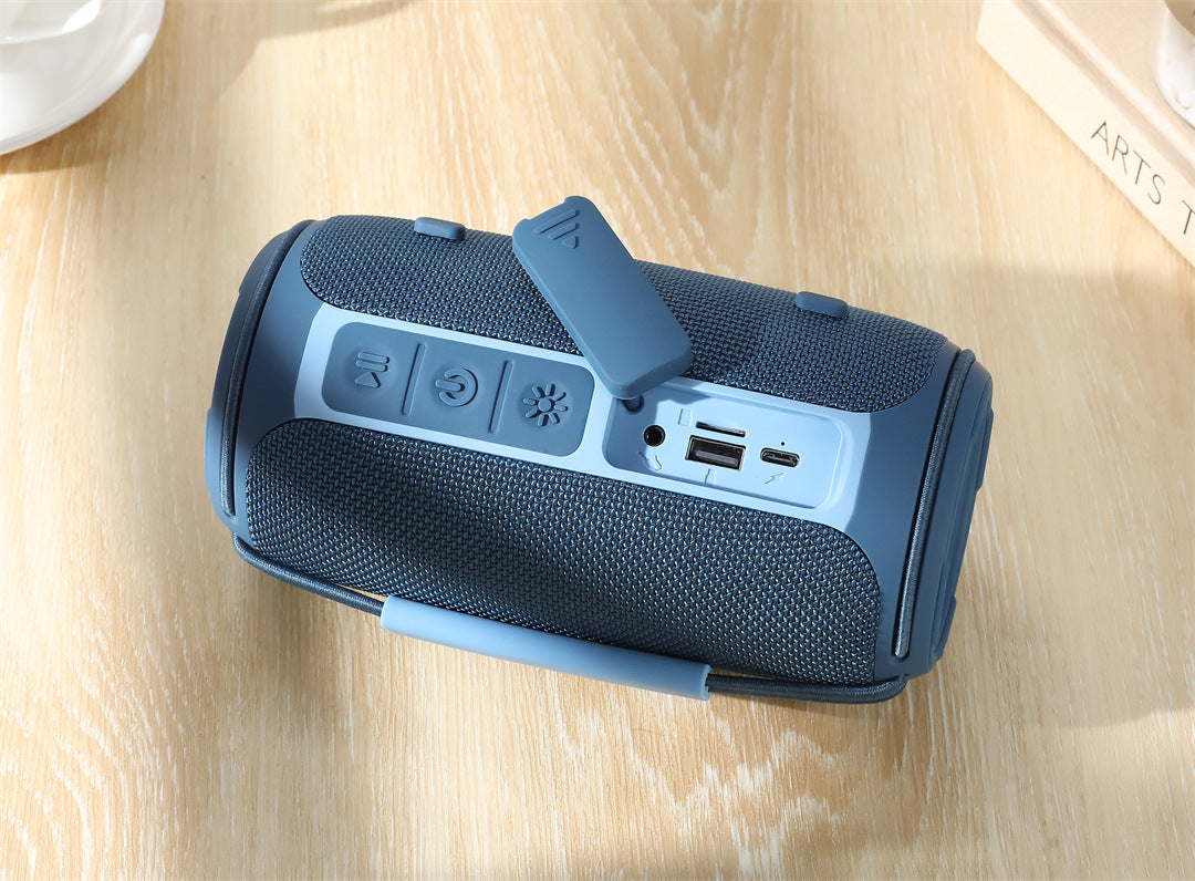 Cross-Border New Bluetooth Speaker TG657 Outdoor Portable Sports Cylindrical RGB Lighting Handheld Subwoofer Speaker